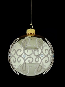 A glass Christmas bauble with an ornamental decoration.