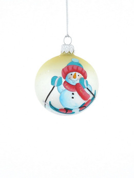 A glass Christmas bauble with a snowman drawing