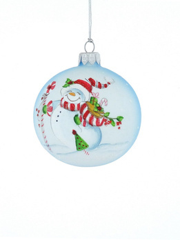 A glass Christmas bauble with a snowman drawing