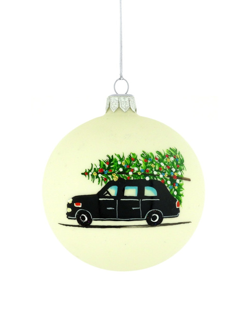 A glass Christmas tree ornament with a hand-painted car